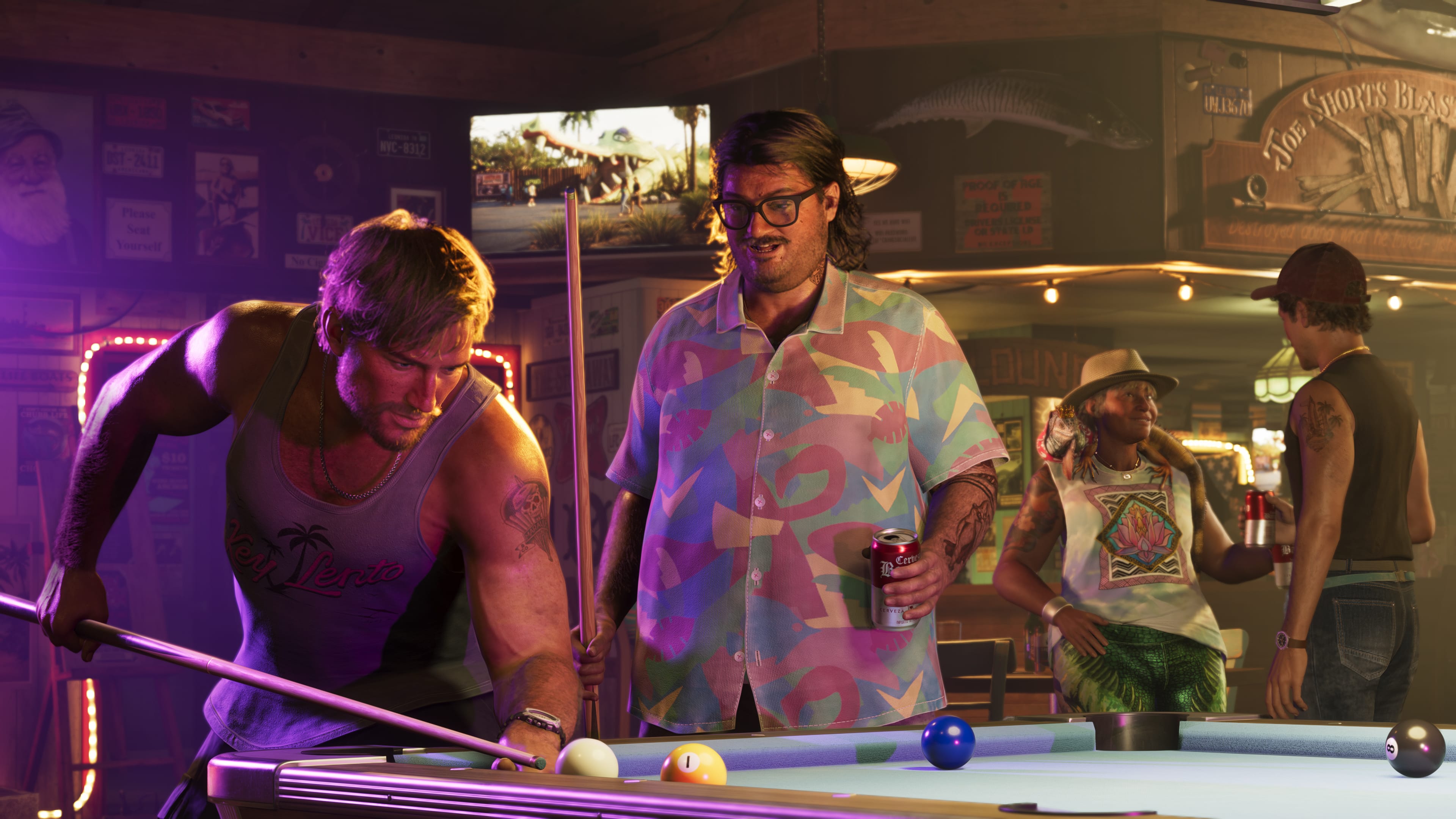 group of individuals playing pool in a bar
