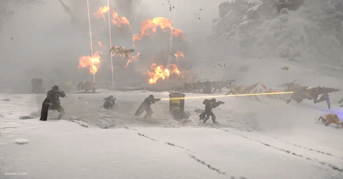 A squad of Helldivers firing heavy weapons at massive Terminid bugs under heavy fire