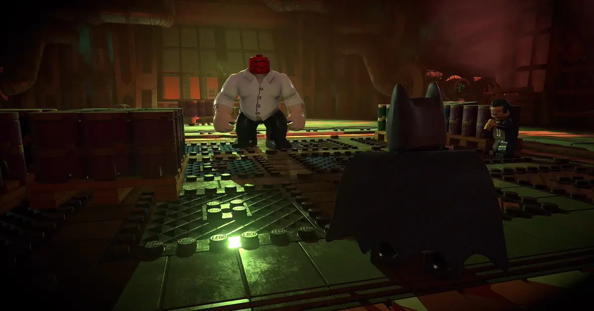 Batman performing a counter-attack on a street thug in LEGO Batman Legacy of the Dark Knight