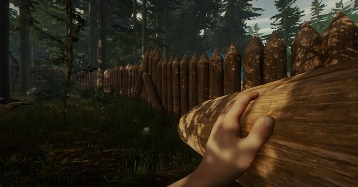 Two players cooperating to build a defensive log wall in a forest clearing